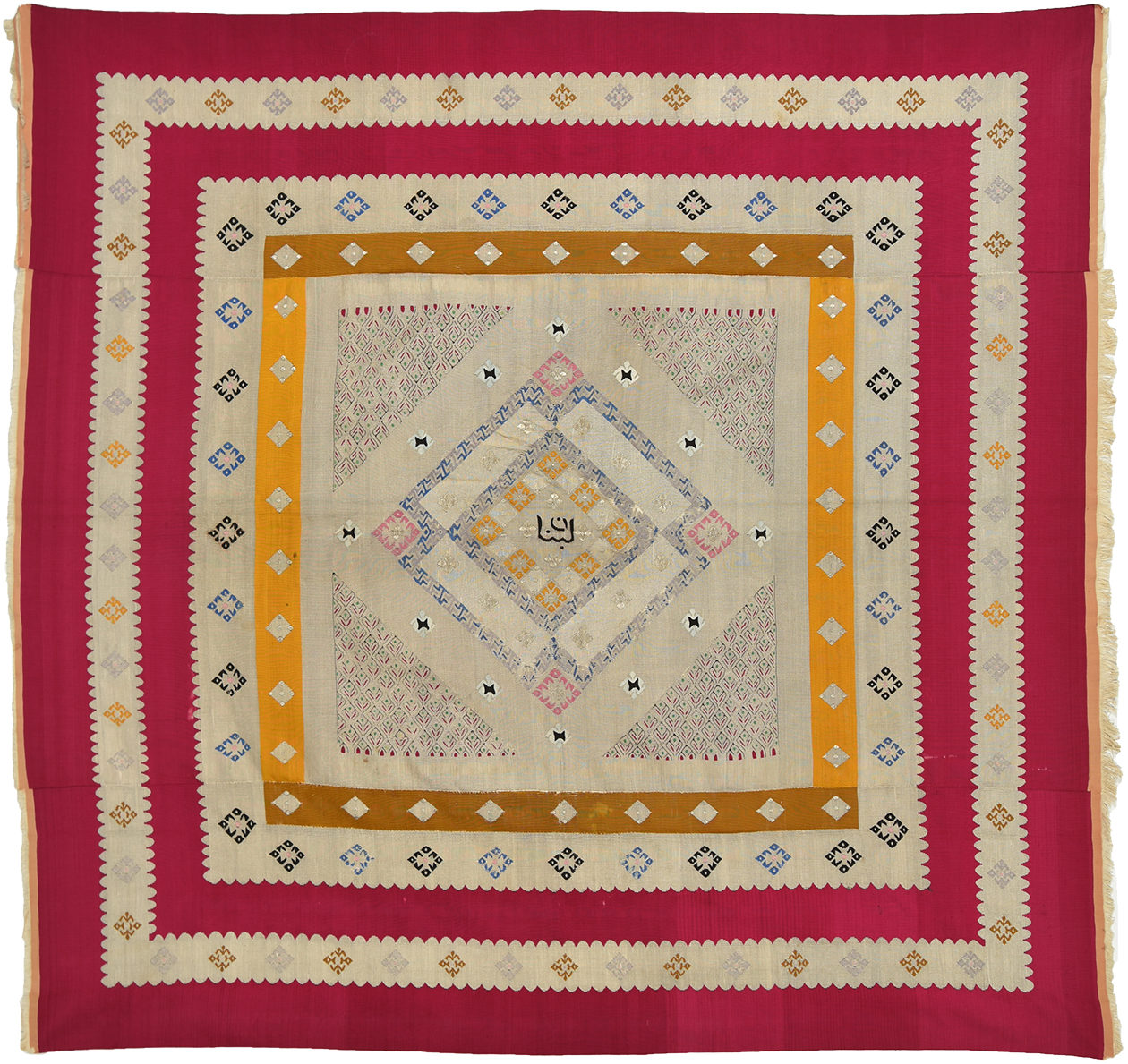 Syrian tapestry with the word Lebanon in Arabic script