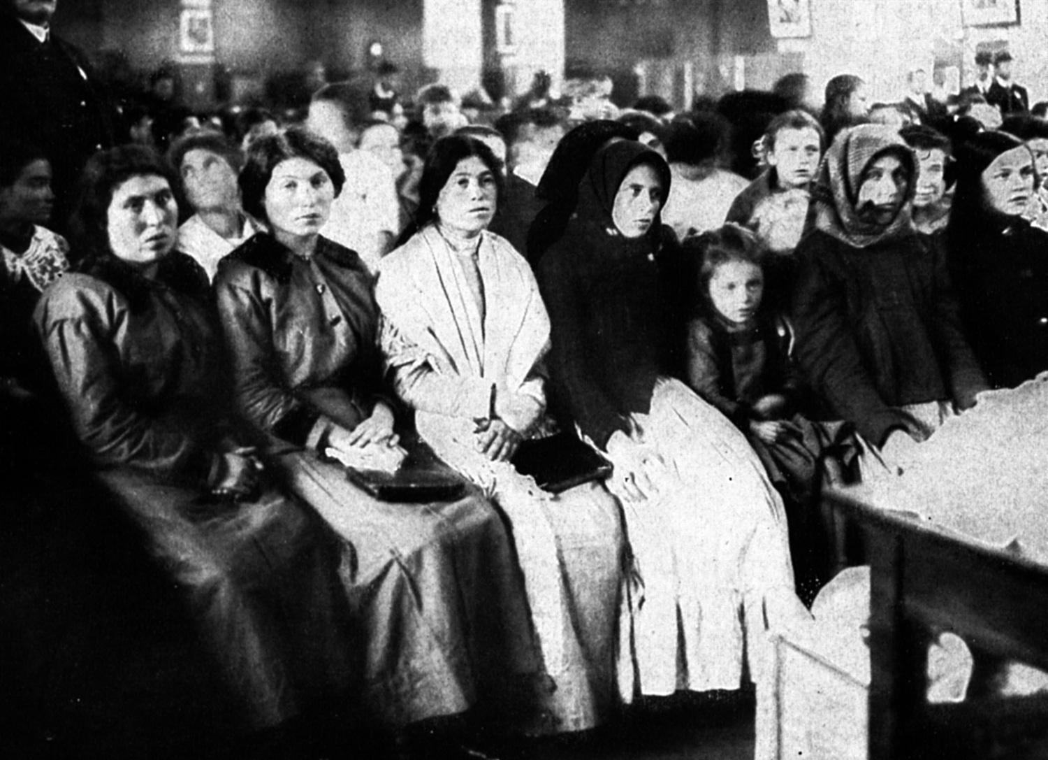 Immigrants waiting at Ellis Island